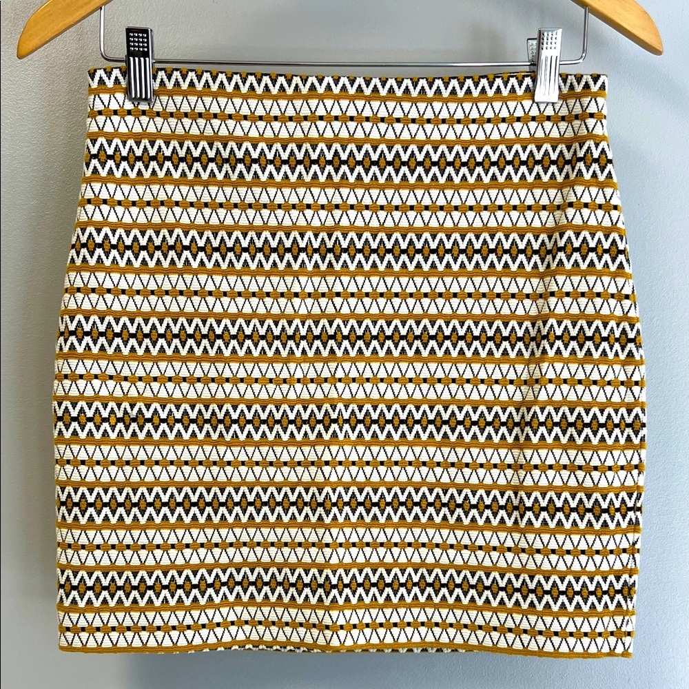Boho mini skirt unique, gold cream, and black pattern made by Express
